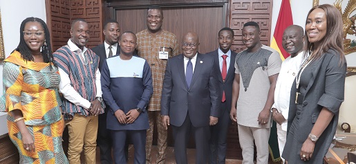 President Akufo-Addo with members of the Mobile Money Agents Association of Ghana  and some ministers of state. Picture: SAMUEL TEI ADANO